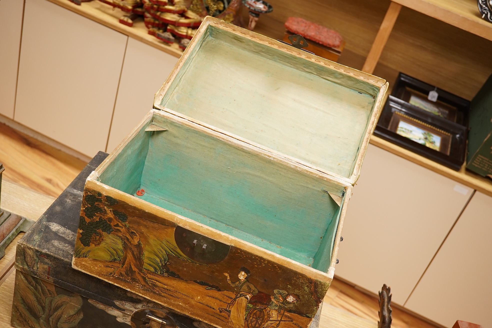 Two Chinese polychrome decorated hide chests, largest 56cm wide